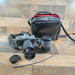 Minolta X370 with a JC Penny f=80 to 200mm zoom lens and prospect f=28-70mm lens